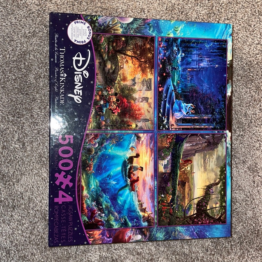 Thomas Kinkade 4 pack 500 piece puzzles.